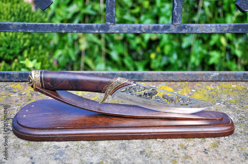 Wallpaper Mural Hunting knife steel, Capricorn hand carved Torontodigital.ca