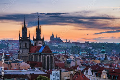 Panorama of Prague with red roofs from above summer day at dusk, Czech Republic