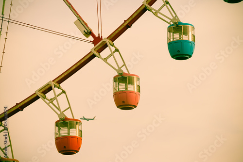 Vintage ferris wheel on sky background - Vintage tone