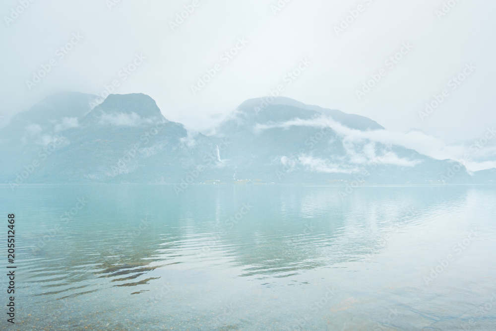 Fjord and Mountains Landscape in Norway Travel foggy weather scenic view Fjord and Mountains Landscape in Norway Travel foggy weather scenic view