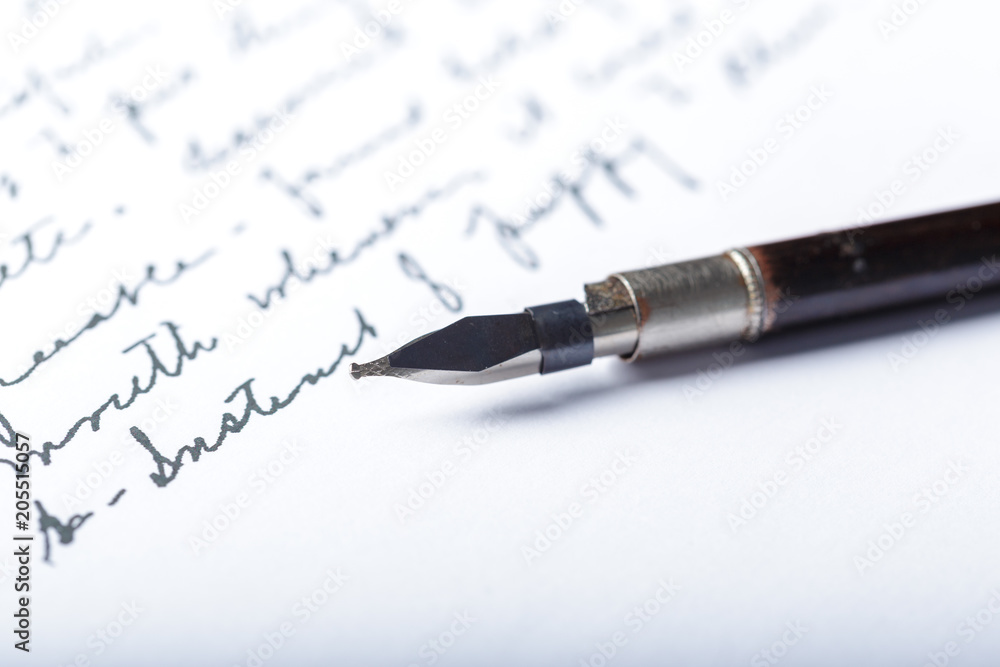 Fototapeta premium Fountain pen on an antique handwritten letter