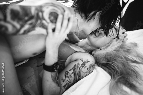 Close up portrait of a sexy young couple kissing.