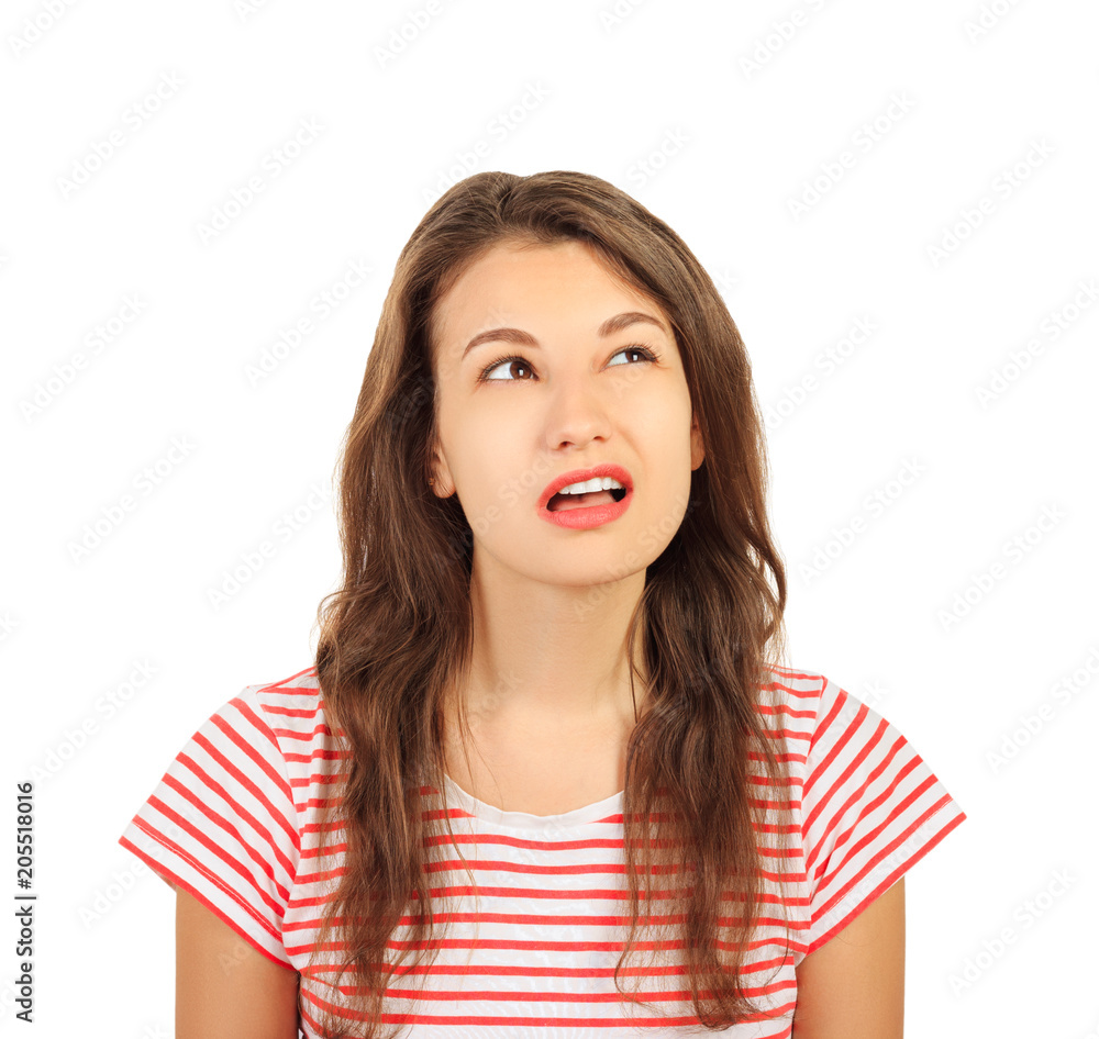 Headshot of indecisive confused young girl. emotional girl isolated on white background Headshot of indecisive confused young girl. emotional girl isolated on white background