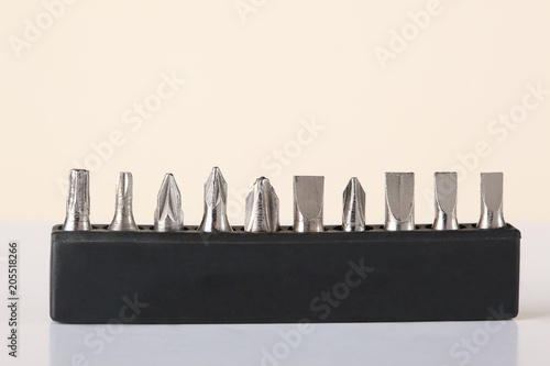 a set of differnt size screwdriver bits photo