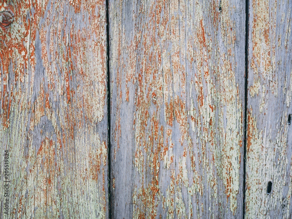 Rustic weathered barn wood background with knots and nail holes Rustic weathered barn wood background with knots and nail holes
