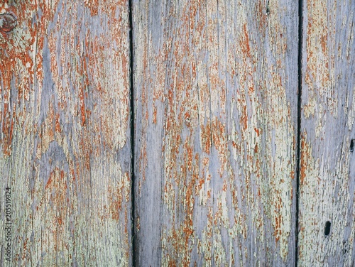 Rustic weathered barn wood background with knots and nail holes