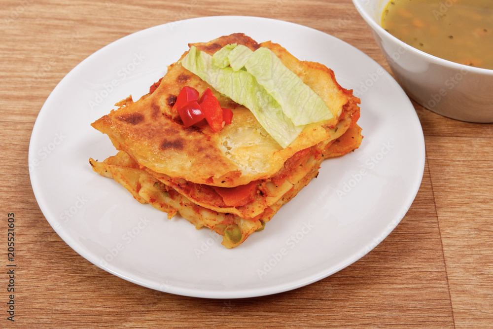 Lasagna with vegetables on a table Lasagna with vegetables on a table