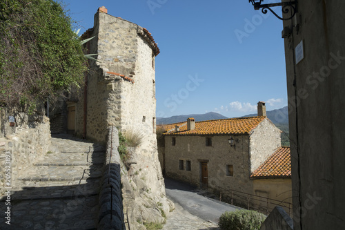 Small street in Eus city, France photo