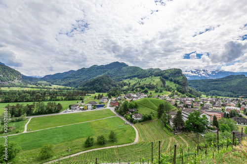 View of the city among the mountainous Alps in Liechtenstein.