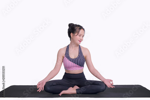 young woman practicing yoga To strengthen the shape of meditation strength in the whtie background