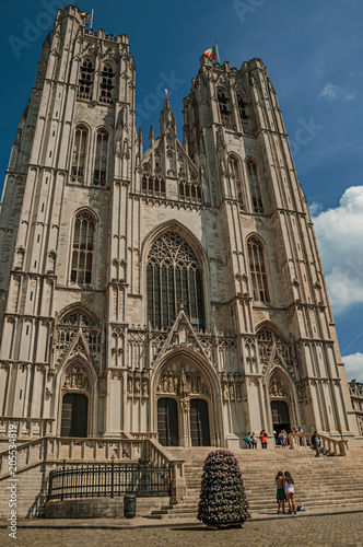 Gothic facade of St. Michael and St. Gudula’s Cathedral and blue sunny sky in Brussels. Vibrant and friendly, is the country’s capital and administrative center of the EU. Central Belgium.