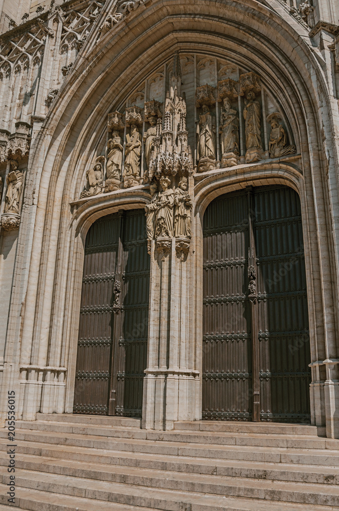 Wooden gate with Gothic sculptures in the Cathedral of St. Michael and St. Gudula at Brussels. Vibrant and friendly, is the country’s capital and administrative center of the EU. Central Belgium.