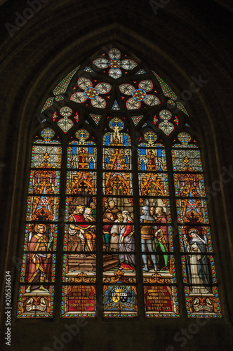 Colorful stained glass window in the St. Michael and St. Gudula Cathedral at Brussels. It is the country   s capital and administrative center of the EU. Central Belgium