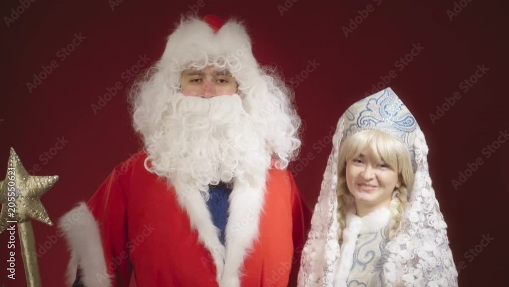 Santa Claus and Snow Maiden congratulates everyone on Christmas and New Year Santa Claus and Snow Maiden congratulates everyone on Christmas and New Year