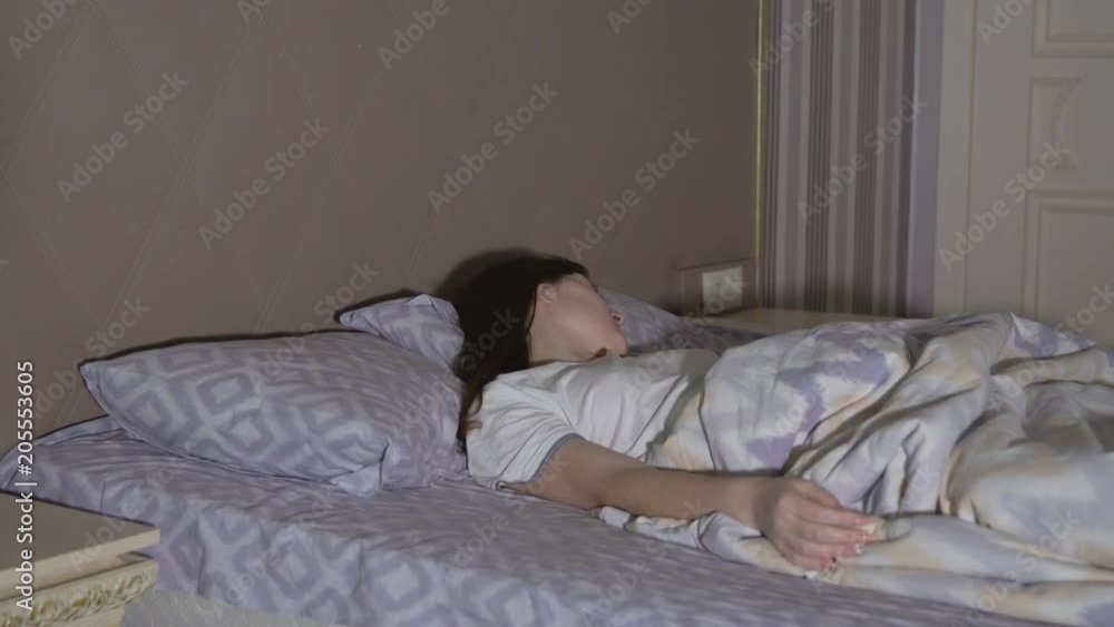 Young woman having a nightmare. Restless dreams. Young woman having a nightmare. Restless dreams.