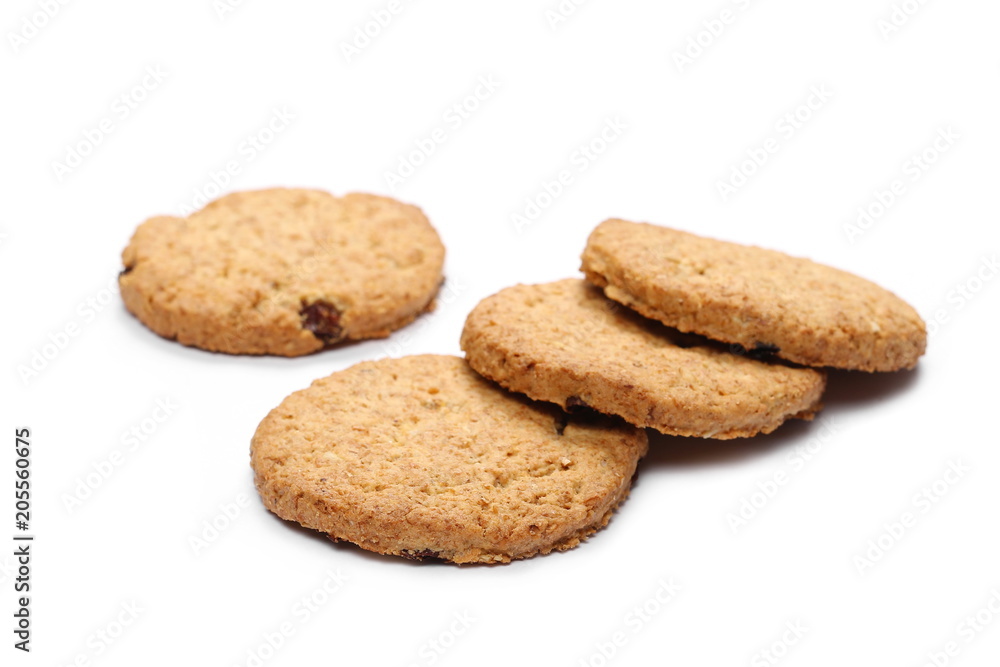 Round wholewheat biscuits with raisins isolated on white background Round wholewheat biscuits with raisins isolated on white background