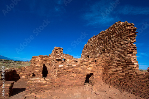 The ruins of ancient Anasazi Lomaki Pueblo are protected inside Wupatki National Monument near Flagstaff  Arizona