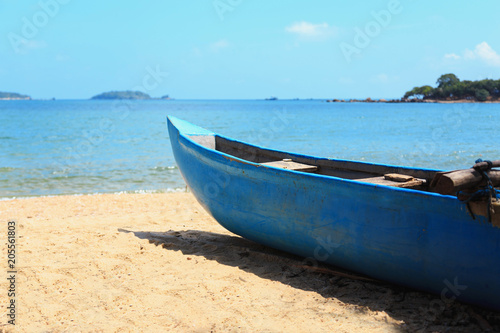 fishery  fishing wooden boat on the tropical coast