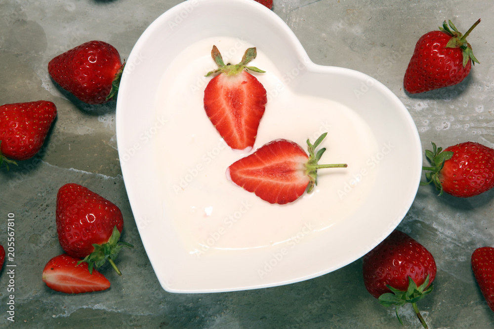 strawberry yogurt in bowl with fresh strawberries strawberry yogurt in bowl with fresh strawberries