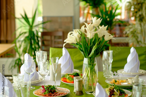 Beautiful flowers on table in wedding day photo