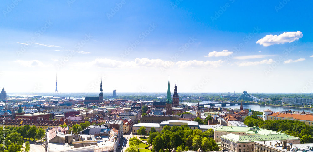 Top view on the old town with beautiful colorful buildings and streets in Riga city, Latvia, bird eye panoramic view