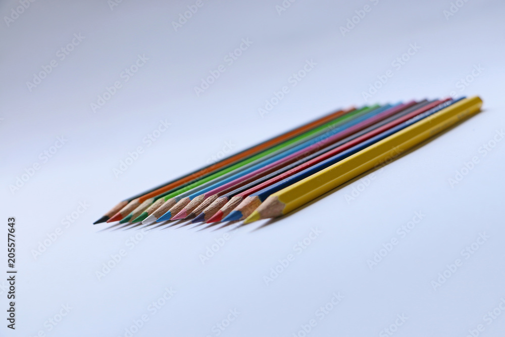 Close up of multi colored pencils in a row
Close up of multi colored pencils in a row