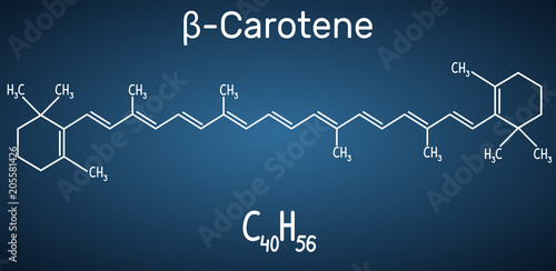 Beta Carotene, provitamin A, is an organic red-orange pigment in plants and fruits. Structural chemical formula and molecule model on the dark blue background
