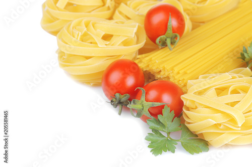 Pasta spaghetti and fettuccine with cherry tomatoes and parsley. isolated