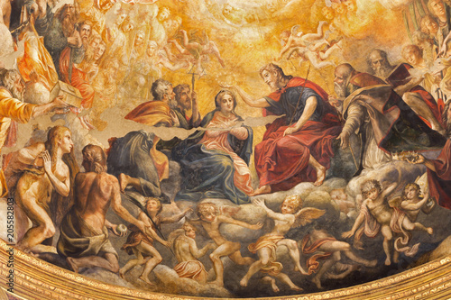 PARMA, ITALY - APRIL 16, 2018: The fresco of Coronation of Virgin Mary in main apse of church Chiesa di Santa Mari della Steccata by Michelangelo Anselmi (1541).