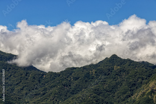 Clouds gather over mountains near the Bena traditional village in Flores, Indonesia.