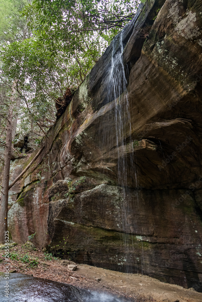 Waterfall cascading over rock ledge at Cumberland Falls State Park Waterfall cascading over rock ledge at Cumberland Falls State Park