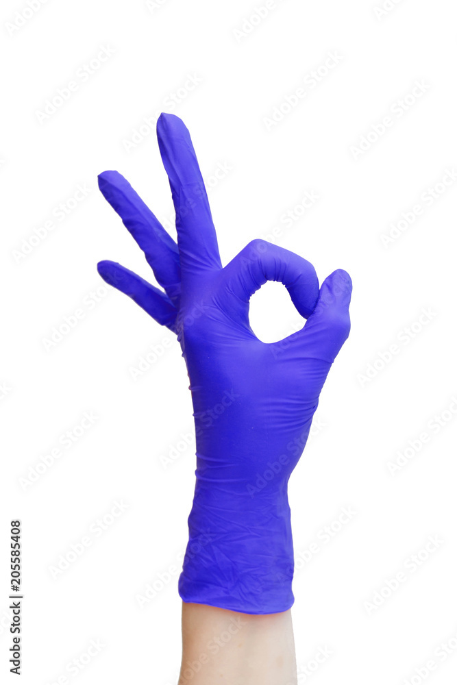 Obraz premium Ok sign made of purple medical gloves. Fingers Okay symbol. Healthy lifestyle, vitamins, vaccination, afraid of injections, medical store, pharmacy, recovery, useful habits, proper nutrition