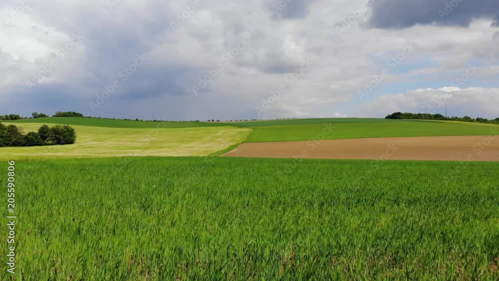 Aerial flight over fields on countryside - agriculture Aerial flight over fields on countryside - agriculture