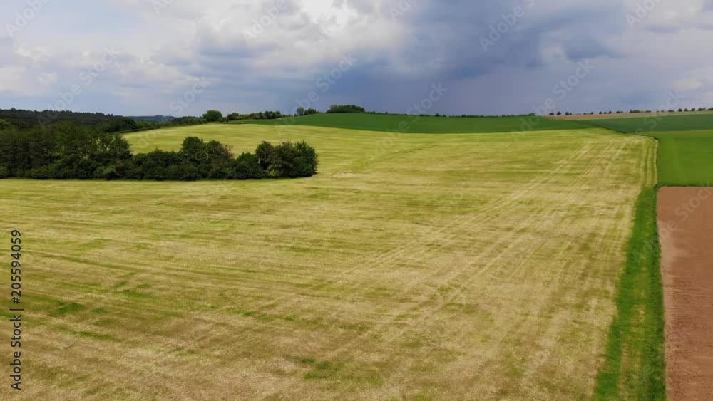 Aerial flight over fields on countryside - agriculture Aerial flight over fields on countryside - agriculture