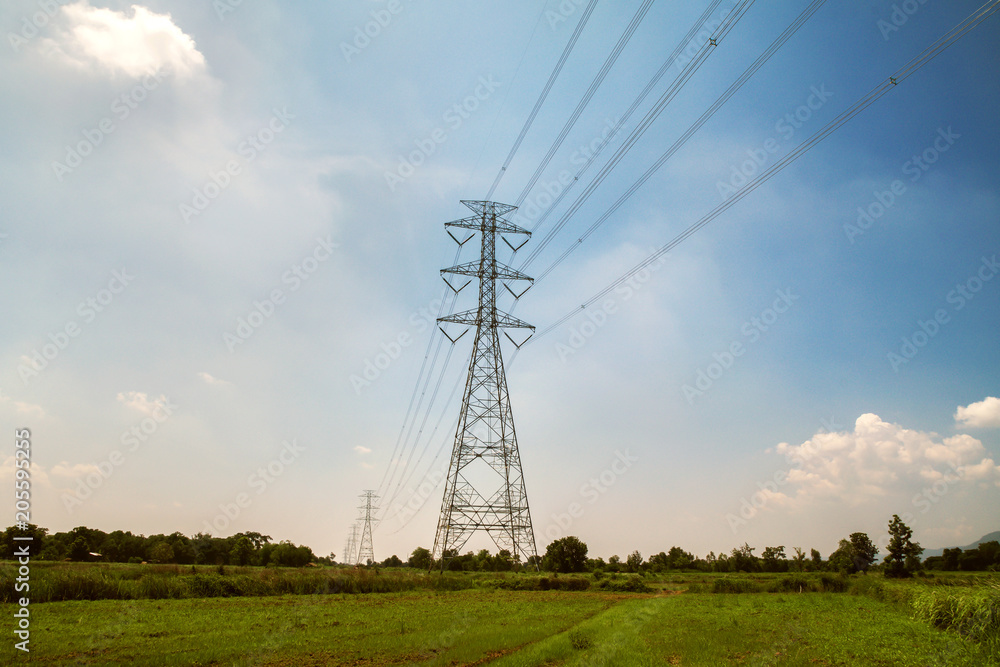 high voltage tower with solar energy background