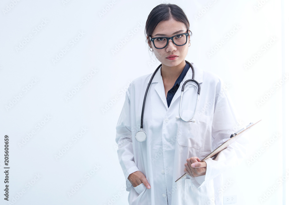 Beautiful Asian doctor with stethoscope looking at camera, white background Beautiful Asian doctor with stethoscope looking at camera, white background