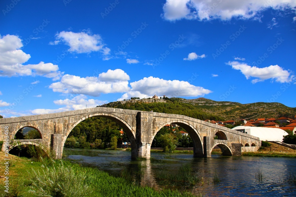 A arched bridge in bosnia and herzegovina which is built entirely of stone