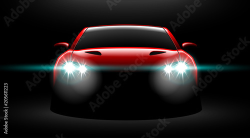 realistic red sport car view with unlocked headlights in the dark