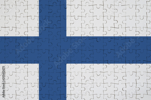Canvas Print Finland flag  is depicted on a folded puzzle