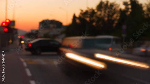 Time lapse of crossroad. Lights of city at beautiful sunset.
