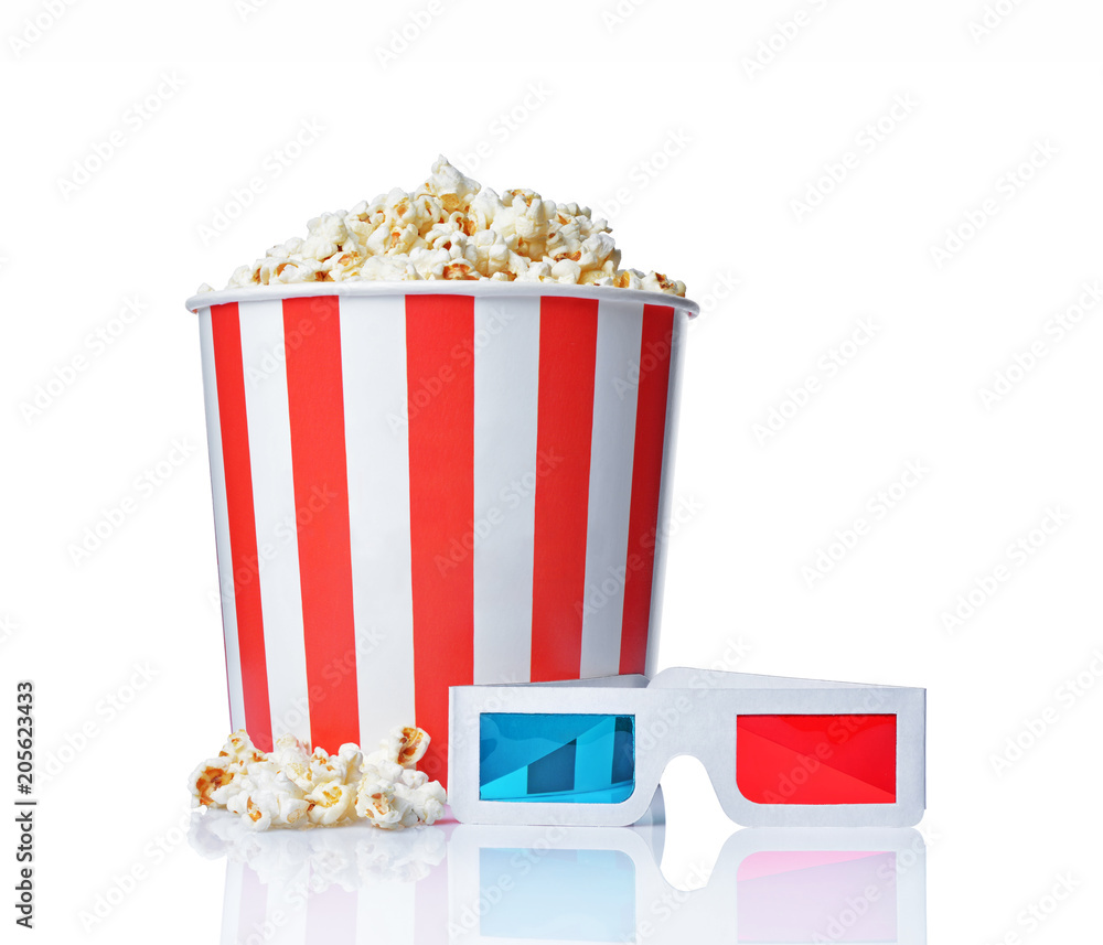 Fototapeta premium Large bucket of appetizing salty popcorn with 3d anaglyph glasses
