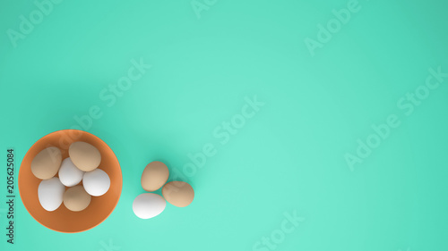 Chicken eggs into a orange cup on the table, turquoise background with copy space, breakfast easter food concept idea, top view
