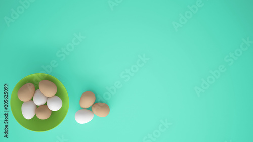 Chicken eggs into a green cup on the table, turquoise background with copy space, breakfast easter food concept idea, top view