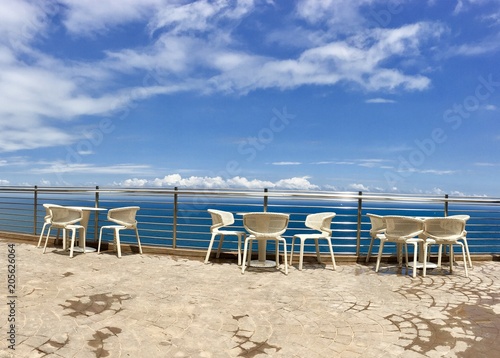 Fototapeta Naklejka Na Ścianę i Meble -  Terrace sea view with outdoor chairs and table