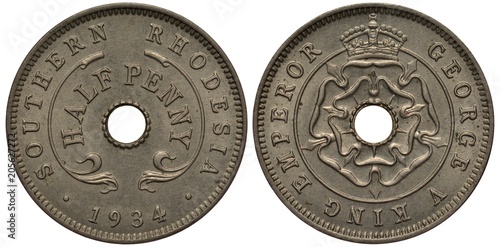 Southern Rhodesia coin half penny 1934, center hole, vignettes at sides, flower, crown on top, ruler George V,