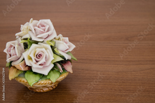 Roses on wooden background