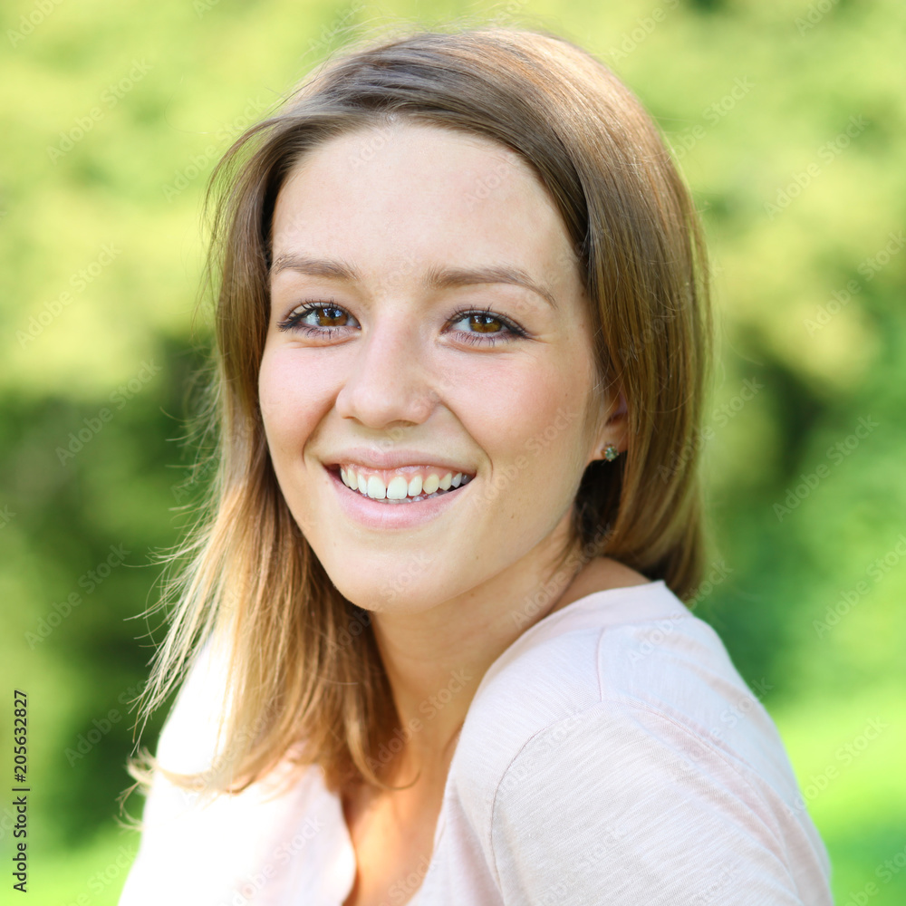 Portrait close up of young beautiful blonde woman