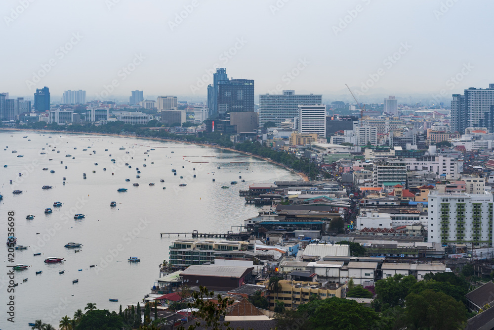 Pattaya city and the many boats docking