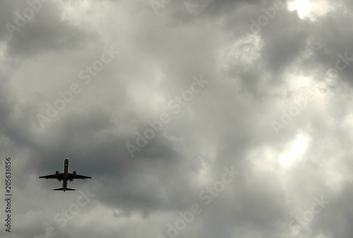 airplane in storm clouds