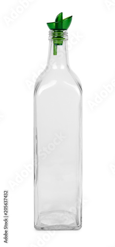 Empty transparent glass oil dispenser isolated on white background